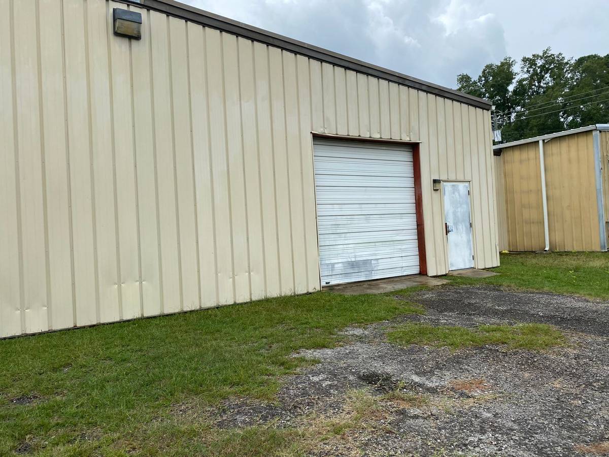 Commercial loading dock area cleaned by pressure washing