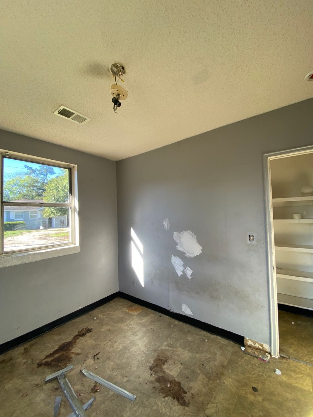 Bedroom painted with clean window trim